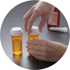 Preparing Xyrem doses: close lids